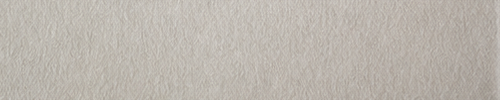 Close view of a cream, deckle-edged paper note